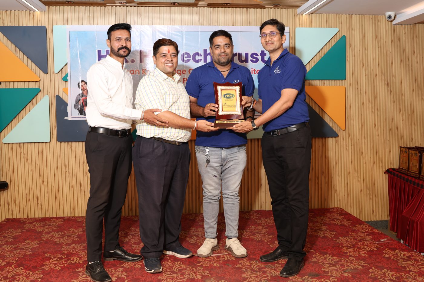 Bhavika Academy team receiving RKCL recognition award